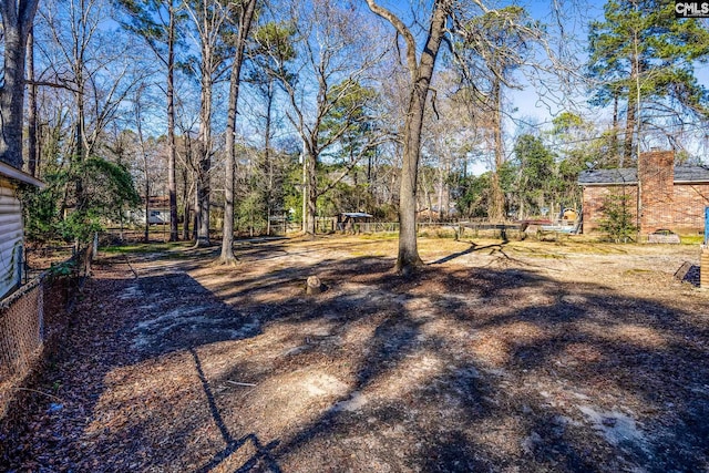 view of yard featuring fence