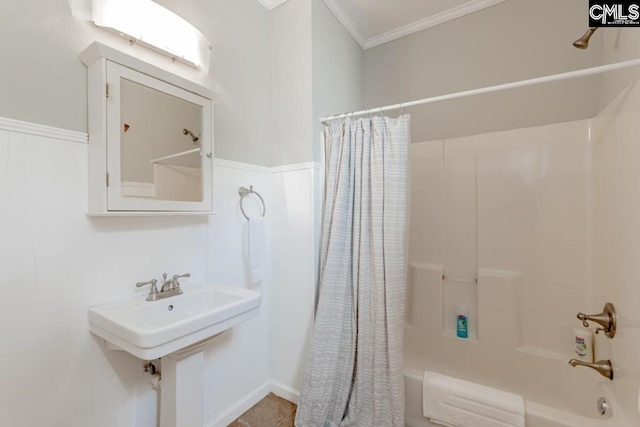 bathroom with shower / bath combination with curtain and crown molding