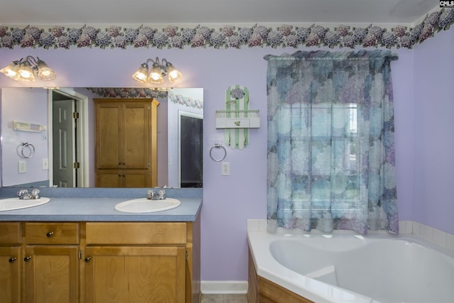 bathroom with double vanity, a sink, and a bath