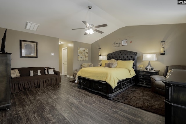 bedroom featuring a ceiling fan, vaulted ceiling, baseboards, and wood finished floors