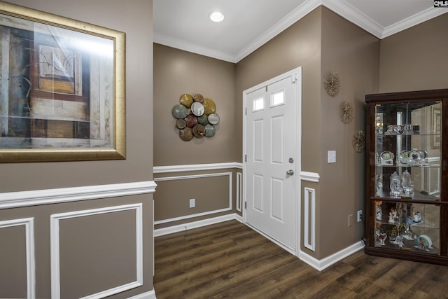 entrance foyer featuring dark wood-type flooring, recessed lighting, crown molding, and baseboards