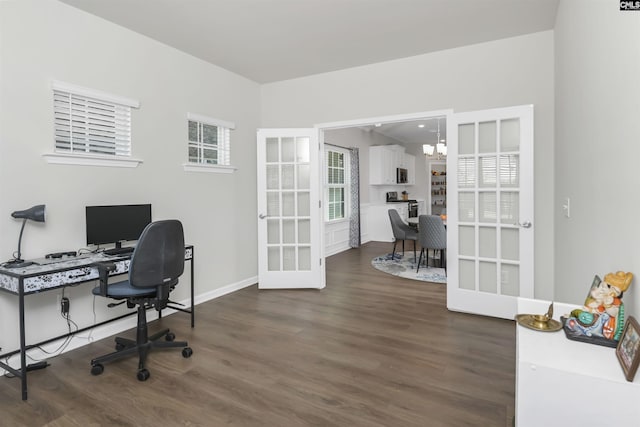 office area with french doors, dark wood-type flooring, and baseboards