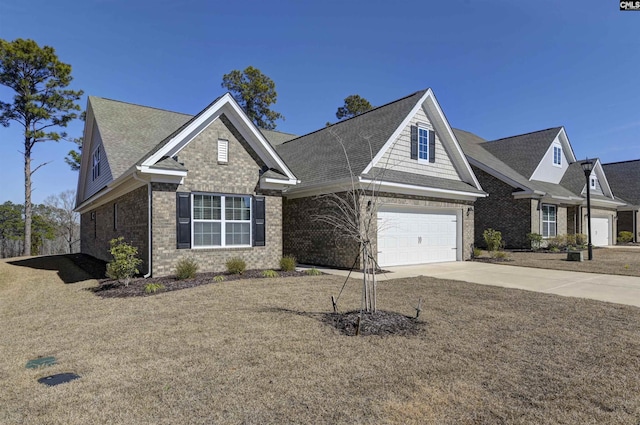 view of front facade with an attached garage, concrete driveway, and brick siding