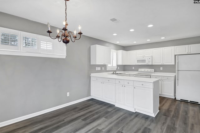 kitchen featuring white appliances, a sink, white cabinetry, baseboards, and light countertops