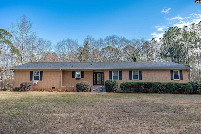 ranch-style house featuring a front lawn, crawl space, and brick siding