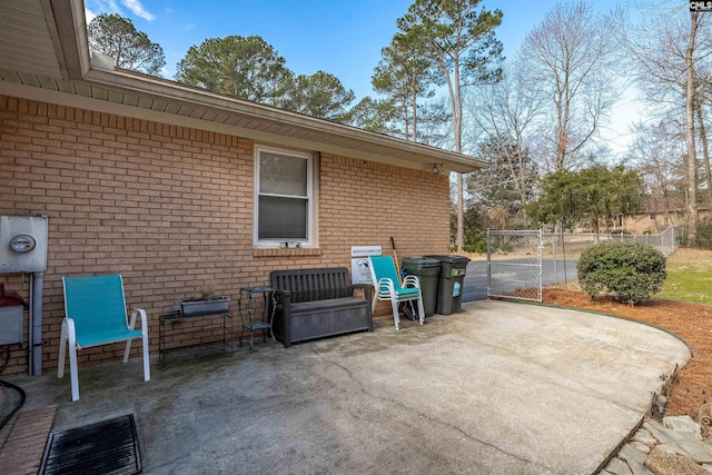 view of patio / terrace featuring fence