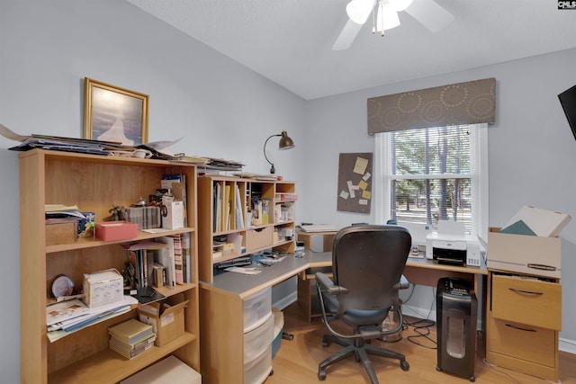 office featuring light wood-type flooring and a ceiling fan