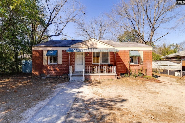 bungalow with crawl space and brick siding