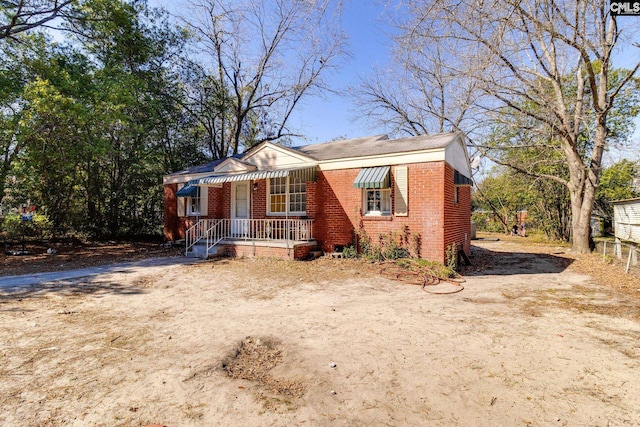 bungalow with brick siding