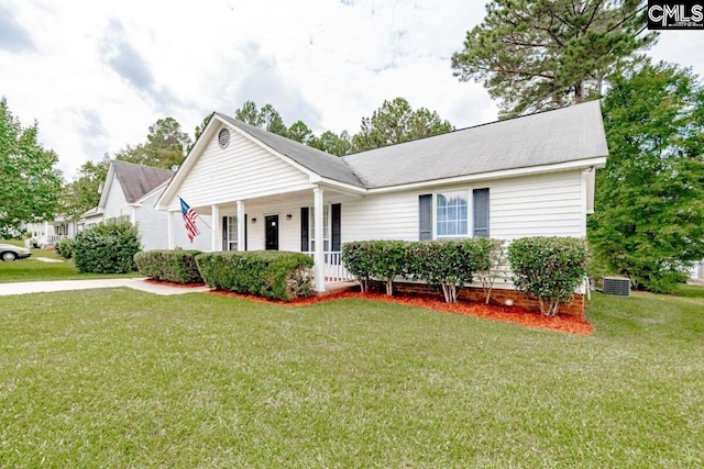 view of front of property with covered porch and a front yard