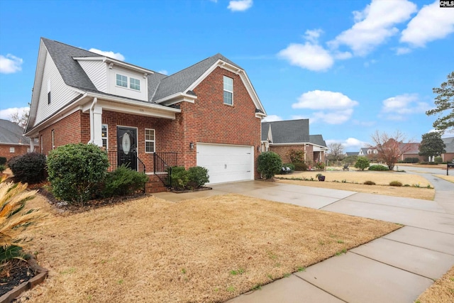 traditional home with an attached garage, a shingled roof, concrete driveway, and brick siding