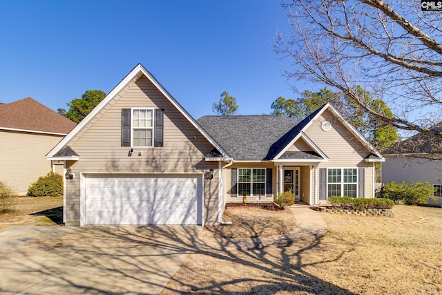 traditional home with a garage and driveway