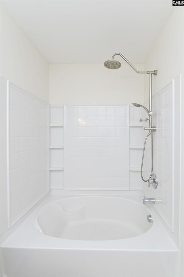 bathroom with shower / bathing tub combination