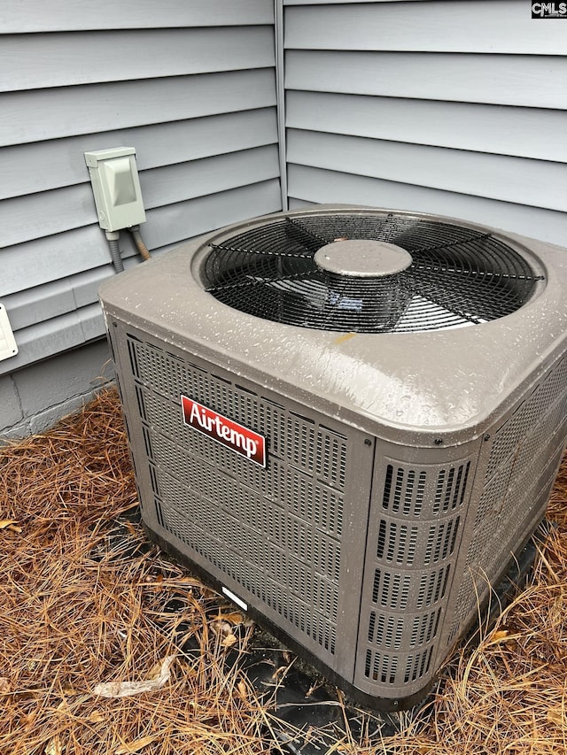 exterior details featuring central AC