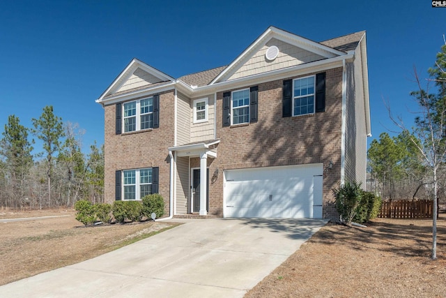 view of front of house with a garage, concrete driveway, and brick siding