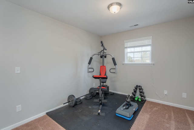 workout area featuring visible vents and baseboards