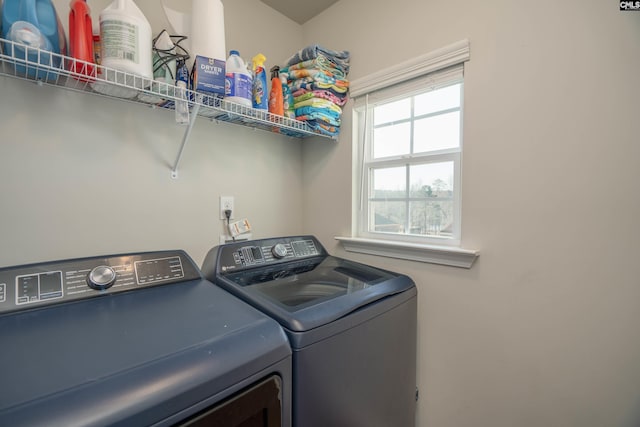 laundry room with laundry area and washer and dryer