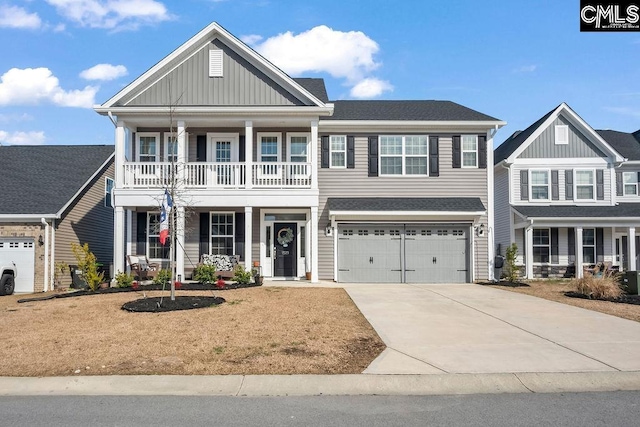 view of front of property with a porch, a balcony, a garage, concrete driveway, and board and batten siding