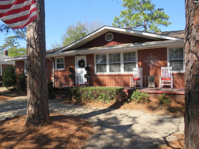 view of front of home with brick siding