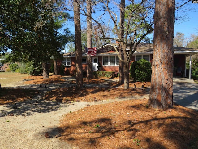 ranch-style house with brick siding