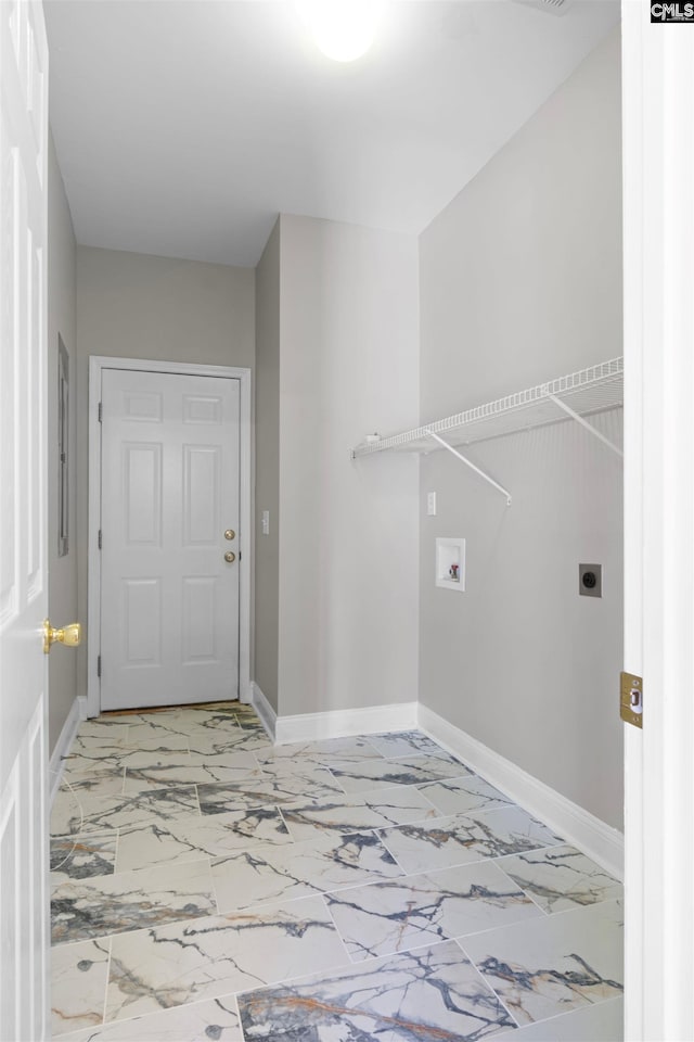 washroom with marble finish floor, laundry area, baseboards, and hookup for an electric dryer