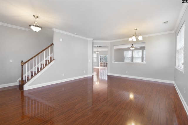 unfurnished living room with dark wood-type flooring, crown molding, stairway, and baseboards