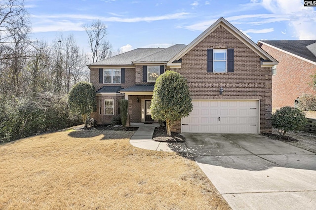 traditional-style home with concrete driveway, brick siding, and an attached garage