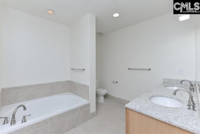 full bath featuring a tub to relax in, toilet, recessed lighting, a sink, and double vanity