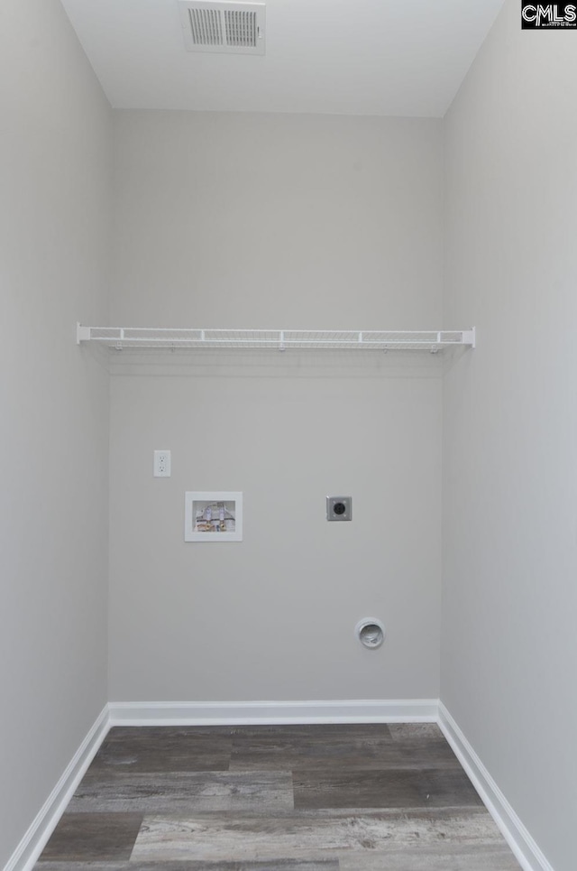 laundry room with hookup for a washing machine, laundry area, dark wood-type flooring, visible vents, and electric dryer hookup