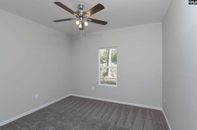 unfurnished room featuring ceiling fan, carpet, and baseboards