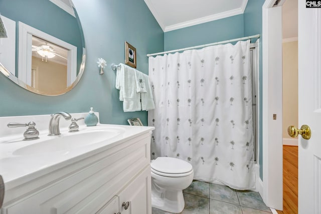 bathroom with crown molding, toilet, shower / tub combo, vanity, and tile patterned floors