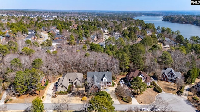 bird's eye view with a water view and a residential view