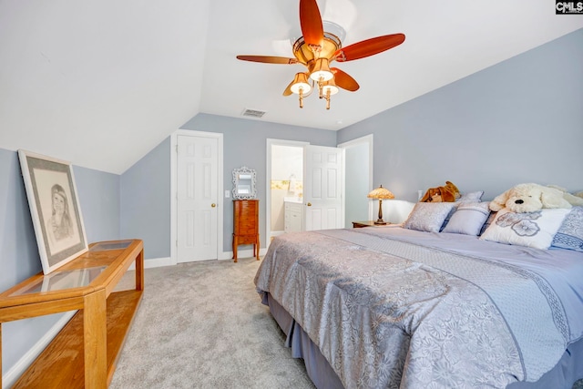 bedroom featuring light carpet, visible vents, baseboards, a ceiling fan, and lofted ceiling