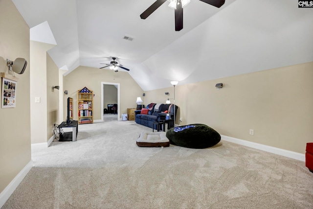 living area with ceiling fan, light carpet, visible vents, baseboards, and vaulted ceiling