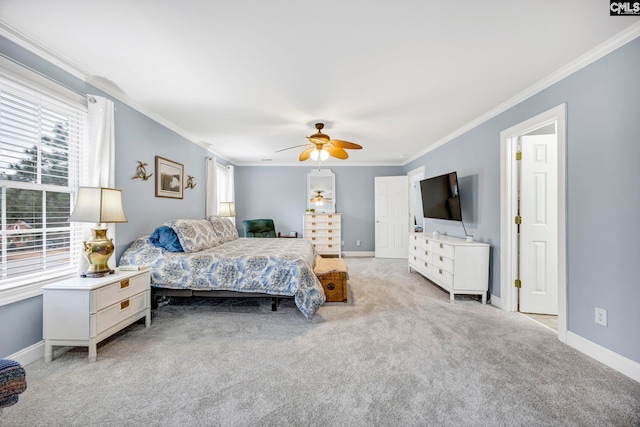 bedroom with light carpet, multiple windows, and crown molding