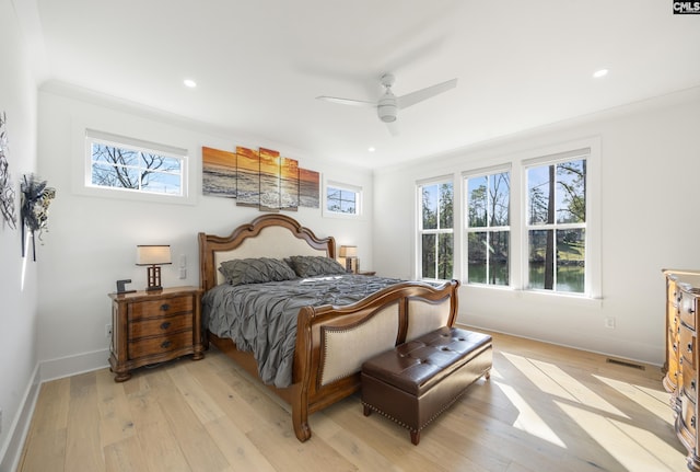 bedroom with recessed lighting, a ceiling fan, visible vents, baseboards, and light wood-type flooring