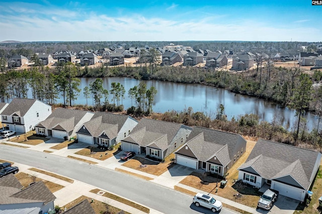 aerial view featuring a water view and a residential view