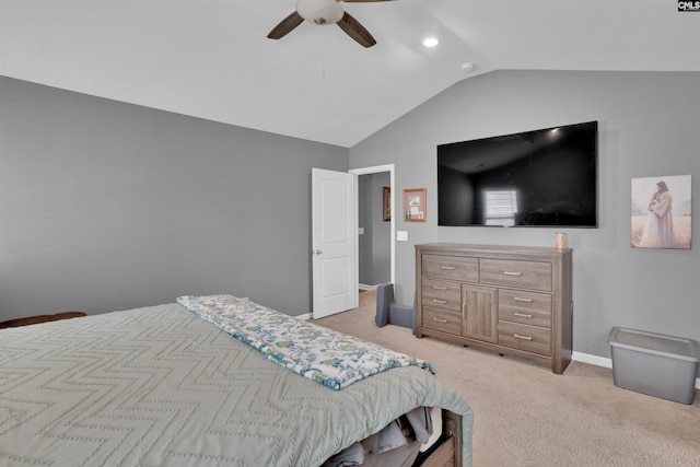 bedroom with lofted ceiling, baseboards, a ceiling fan, and light colored carpet