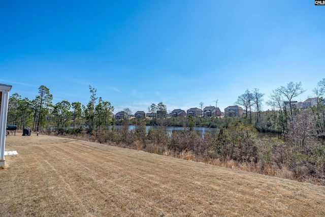 view of yard featuring a water view