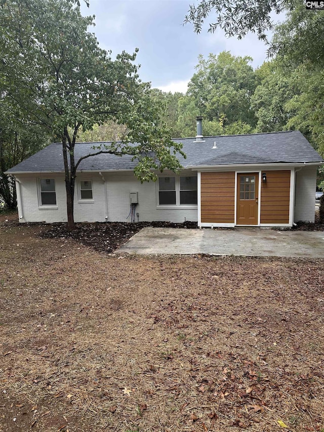 rear view of house with a patio area