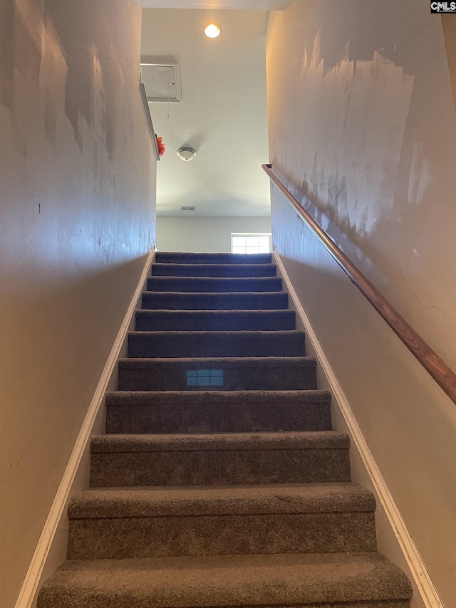 stairs with recessed lighting