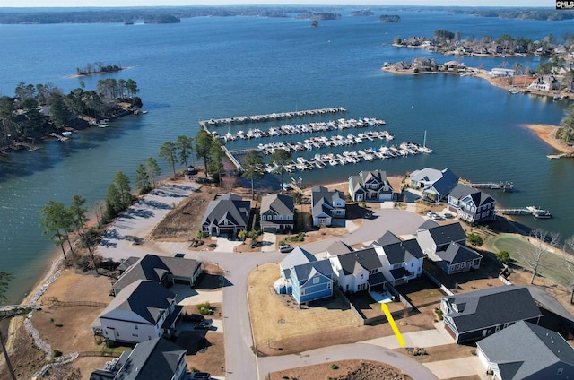 aerial view featuring a residential view and a water view