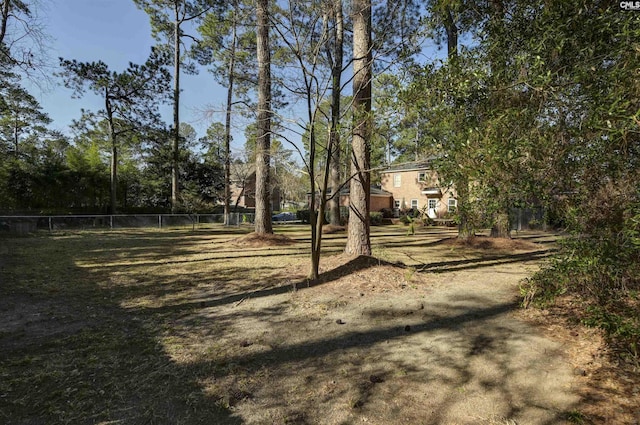 view of yard featuring fence