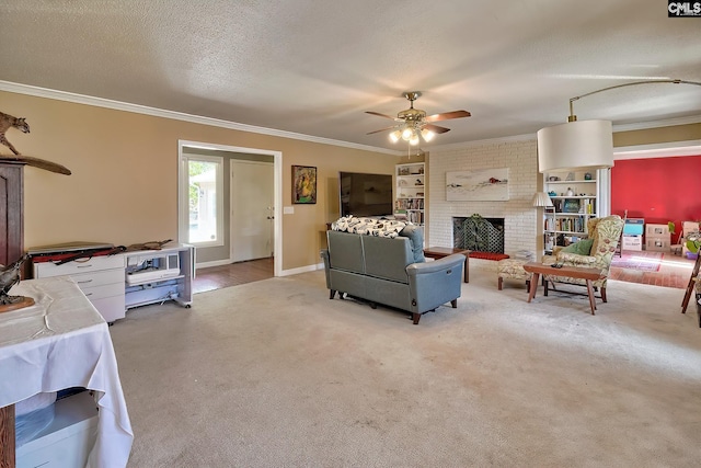 living room with light carpet, a ceiling fan, crown molding, a textured ceiling, and a fireplace