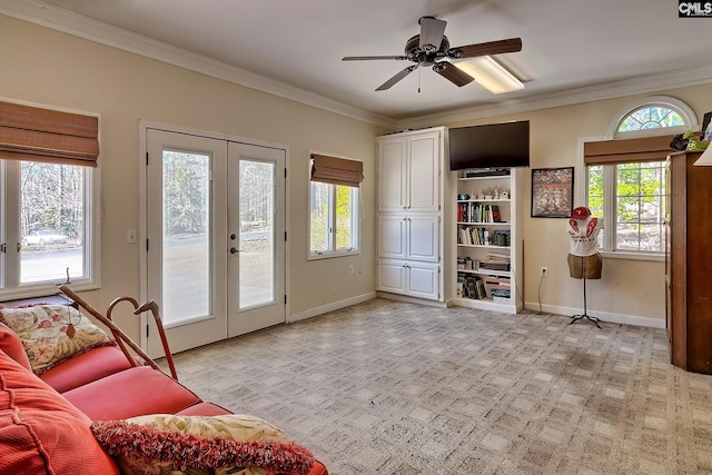 interior space featuring ornamental molding, french doors, and baseboards