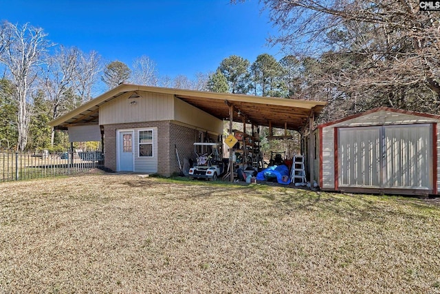 view of shed featuring fence