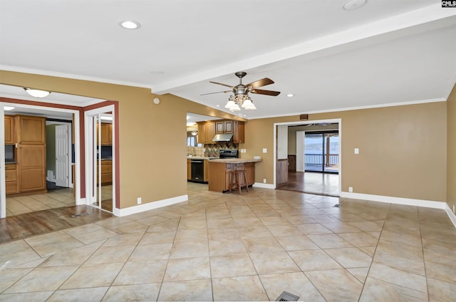 unfurnished living room featuring ceiling fan, baseboards, ornamental molding, and light tile patterned flooring