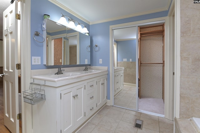 full bath with tile patterned flooring, a sink, visible vents, double vanity, and crown molding