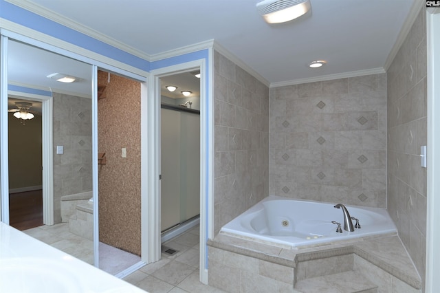 bathroom with tile walls, ornamental molding, tile patterned floors, a whirlpool tub, and a stall shower