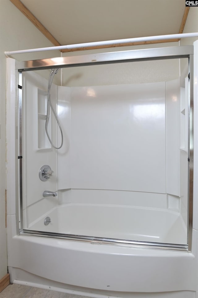 bathroom featuring shower / bathing tub combination and tile patterned floors